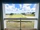 Relax with beautiful views of the lush golf course from this unit's private balcony at 7673 Heritage Crossing Way # 202, Reunion, FL 34747