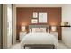 Charming bedroom with a neutral palette, soft lighting, decorative pillows, and playful animal artwork at 990 Hour Glass Rd, Lakeland, FL 33801
