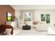 Stylish living room with a comfortable sofa, contemporary furniture, and a bright, airy feel at 990 Hour Glass Rd, Lakeland, FL 33801