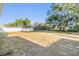 Expansive backyard with plenty of room and privacy, enhanced by a white fence at 2138 Mirasol Dr, Winter Haven, FL 33881