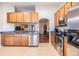 Well-equipped kitchen with stainless appliances, granite countertops, and ample cabinet space at 2138 Mirasol Dr, Winter Haven, FL 33881