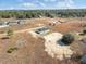 Aerial view of new home with long driveway and expansive lot at 2746 Sw 147Th Ct, Ocala, FL 34481