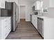 Spacious kitchen layout featuring stainless steel appliances and white cabinets at 2746 Sw 147Th Ct, Ocala, FL 34481