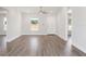 Spacious living room with neutral walls, modern ceiling fan and tile flooring at 2746 Sw 147Th Ct, Ocala, FL 34481