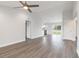 Open-concept living space with tile floors and multiple entryways to other rooms at 2746 Sw 147Th Ct, Ocala, FL 34481