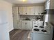 Modern kitchen featuring white cabinets, stainless steel appliances, and new countertops at 400 Sw 1St Ave, Mulberry, FL 33860