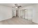 Spacious bedroom boasts neutral carpet, mirrored closet doors, and en-suite vanity area at 1313 Periwinkle Ct, Lakeland, FL 33811