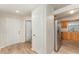 Inviting entryway with a light-colored wood floors and doors at 1313 Periwinkle Ct, Lakeland, FL 33811