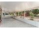 Spacious screened-in patio with tiled floor and views of the large backyard at 1313 Periwinkle Ct, Lakeland, FL 33811