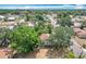 Aerial view of the property showcasing its placement in a lush, green neighborhood at 713 W 3Rd St, Lakeland, FL 33805