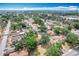 Wide aerial view of a residential neighborhood with mature trees at 713 W 3Rd St, Lakeland, FL 33805