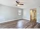 Bedroom featuring flooring, neutral wall color, and natural light from one window at 713 W 3Rd St, Lakeland, FL 33805