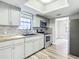 Contemporary kitchen boasting stainless steel appliances, and wooden countertops at 713 W 3Rd St, Lakeland, FL 33805