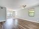 Open living area with modern flooring, neutral paint, and ample natural light at 713 W 3Rd St, Lakeland, FL 33805