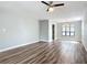 Spacious living room featuring stylish flooring, recessed lighting, and an open layout at 713 W 3Rd St, Lakeland, FL 33805