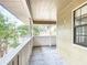 Covered front porch with railings offers a pleasant outdoor space at 713 W 3Rd St, Lakeland, FL 33805