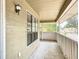 Cozy covered porch offering a tranquil outdoor space with natural light at 713 W 3Rd St, Lakeland, FL 33805