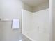 Clean bathroom area featuring a bathtub and towel rack at 1639 Saddlehorn Dr, Lakeland, FL 33810