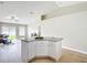 Modern kitchen island with granite countertop, perfect for meal preparation and casual dining at 1639 Saddlehorn Dr, Lakeland, FL 33810