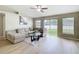 Cozy living room with a comfortable sectional sofa and bright natural light at 1639 Saddlehorn Dr, Lakeland, FL 33810