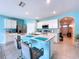 Well-equipped kitchen with stainless steel appliances, breakfast bar, and ample counter space at 3205 Royal Tern Dr, Winter Haven, FL 33881
