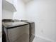 Laundry room featuring a modern front-load Samsung washer and dryer at 3205 Royal Tern Dr, Winter Haven, FL 33881