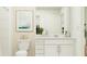 Bathroom with white vanity, decor and a shower at 2759 Pioneer Trl, Eagle Lake, FL 33839