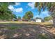 Expansive backyard showcasing ample space for recreation and gardening at 3360 Cross Fox Dr, Mulberry, FL 33860