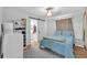 Comfortable bedroom with walk in closet and a sliding barn door at 3360 Cross Fox Dr, Mulberry, FL 33860