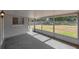 Enclosed patio providing ample space for relaxation or entertaining at 3360 Cross Fox Dr, Mulberry, FL 33860