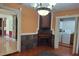 Features a corner fireplace and a doorway leading to a laundry area at 11305 Sw 186Th Cir, Dunnellon, FL 34432