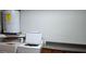 A laundry area with a washing machine and utility sink at 11305 Sw 186Th Cir, Dunnellon, FL 34432