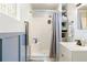 Bathroom featuring a tiled shower with gray shower curtain and a white vanity at 1895 Emerson Ave, Bartow, FL 33830