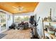 Sunroom with a wood ceiling, tile floors, and several windows offering a bright and cozy space at 1895 Emerson Ave, Bartow, FL 33830