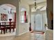 Elegant foyer with tile flooring, opening to the dining room at 242 Prestwick Dr, Davenport, FL 33897