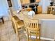 Cozy kitchen bar seating with countertop space at 242 Prestwick Dr, Davenport, FL 33897