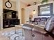 View of the living room showcasing the dark brown leather furniture and decor at 242 Prestwick Dr, Davenport, FL 33897