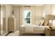 Serene bedroom featuring soft lighting, comfortable bedding, neutral decor, and a soothing atmosphere at 2633 Skyline Loop, Kissimmee, FL 34758