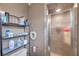 Bathroom featuring shelving, a toilet, and a stand up shower at 424 Forest Glen Ave, Lakeland, FL 33813