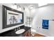 Bathroom features a vanity with a black countertop, an oval sink, a large mirror and toilet at 424 Forest Glen Ave, Lakeland, FL 33813