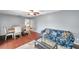 Open concept living and dining area with hardwood floors and comfortable seating at 424 Forest Glen Ave, Lakeland, FL 33813