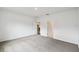 Spacious bedroom features plush carpeting and neutral walls at 5914 Bristle Oak St, Mount Dora, FL 32757