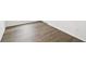 Close up shot of dark wood flooring in living area at 5914 Bristle Oak St, Mount Dora, FL 32757