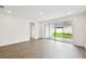 Bright and open living room with sliding doors to outside at 5914 Bristle Oak St, Mount Dora, FL 32757