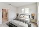 Cozy bedroom with neutral tones, carpet, and simple decor at 6051 Sacred Oak Ave, Mount Dora, FL 32757