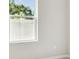 Bedroom with a window and white walls at 6051 Sacred Oak Ave, Mount Dora, FL 32757