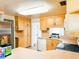 Well-lit kitchen with abundant cabinet space, tile floors, and a practical layout at 1690 S Mcadoo Ave, Bartow, FL 33830