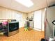 Efficient laundry room with modern washer, dryer, and ample storage space at 1690 S Mcadoo Ave, Bartow, FL 33830