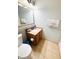 Bathroom featuring a neutral tile, wooden vanity and an ample mirror at 13415 Blue Heron Beach Dr # 1006, Orlando, FL 32821