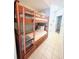 Bedroom featuring built in wooden bunk beds with ample storage at 13415 Blue Heron Beach Dr # 1006, Orlando, FL 32821